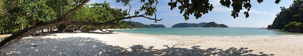 Panoramic view of white sand and green islands at Coral Bay, Pangkor Island