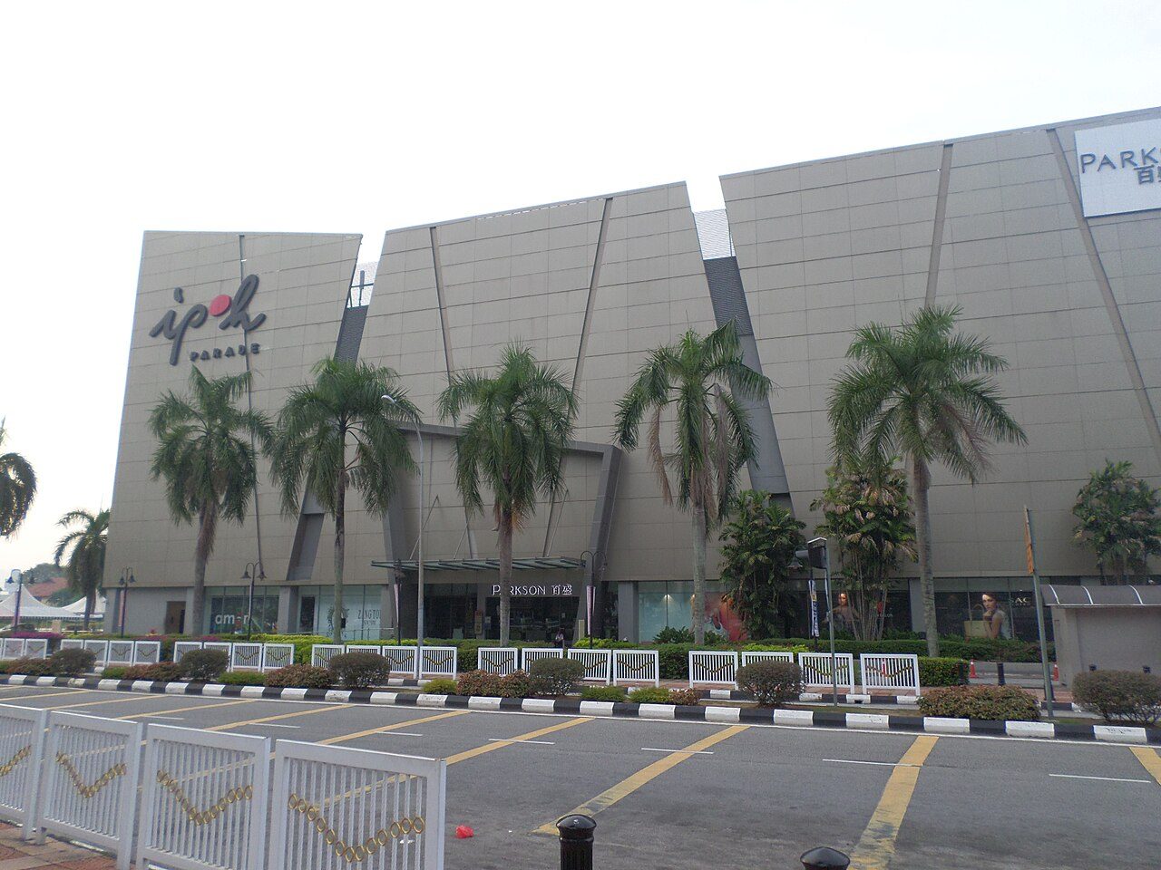 Front of Ipoh Parade with its angled facade and Parkson entrance, one of the main shopping malls in Ipoh