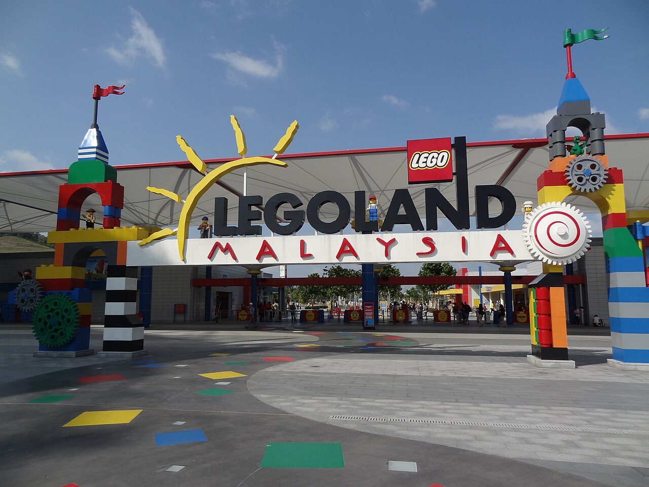 The entrance arch of LEGOLAND Malaysia, built to look like giant LEGO bricks, with the ticket gates behind, one of the things to do in Johor Bahru