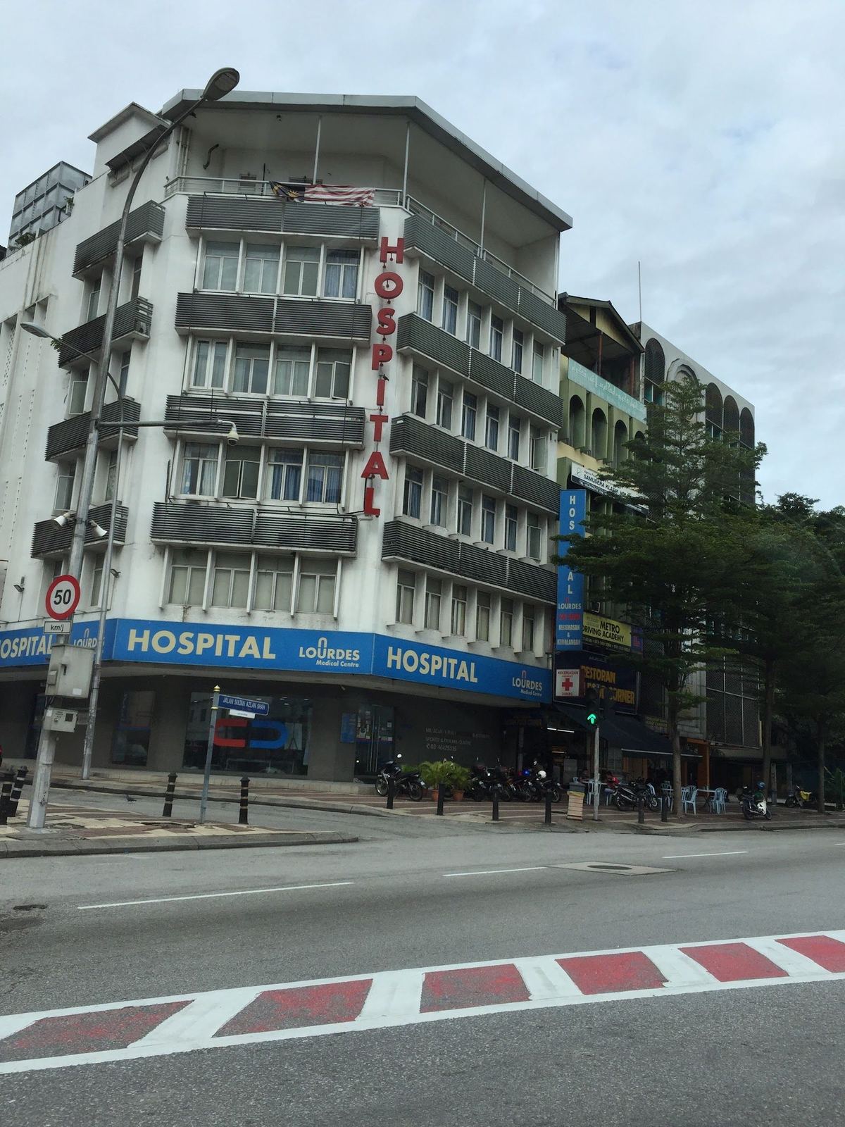 Lourdes Medical Centre building with blue hospital signage on Jalan Sultan Azlan Shah, Kuala Lumpur