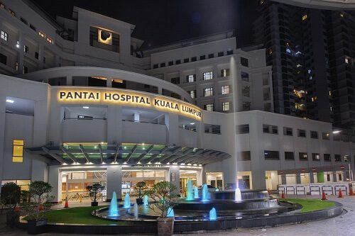 Pantai Hospital Kuala Lumpur main entrance and fountain at night, Bangsar