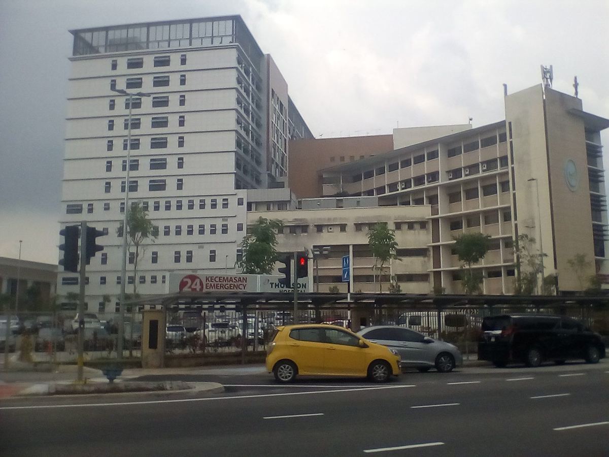 Thomson Hospital Kota Damansara towers and emergency entrance seen from the road, Petaling Jaya