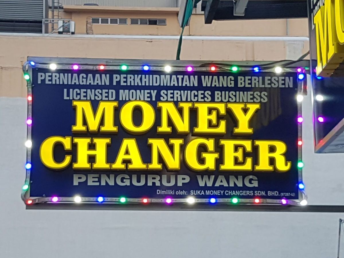 Money changer sign of Suka Money Changers on Jalan Bukit Bintang, Kuala Lumpur