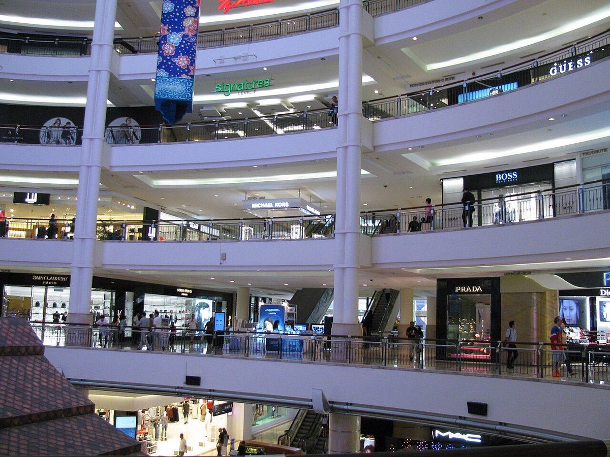 Atrium of Suria KLCC with shops on several levels, one of the best-known shopping malls in Kuala Lumpur