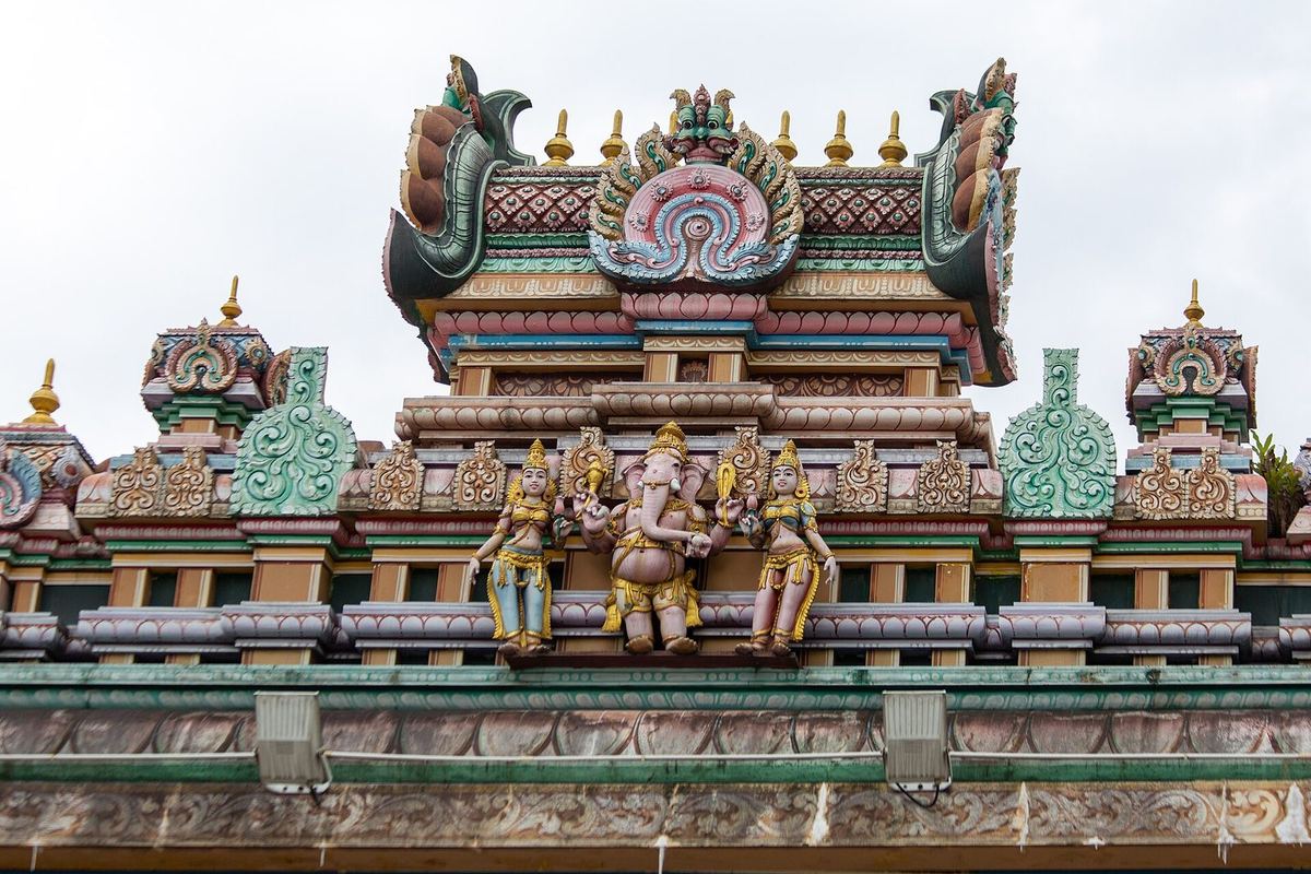 Painted Hindu deity sculptures on the gate tower of Sri Kandaswamy Kovil, Brickfields, Kuala Lumpur
