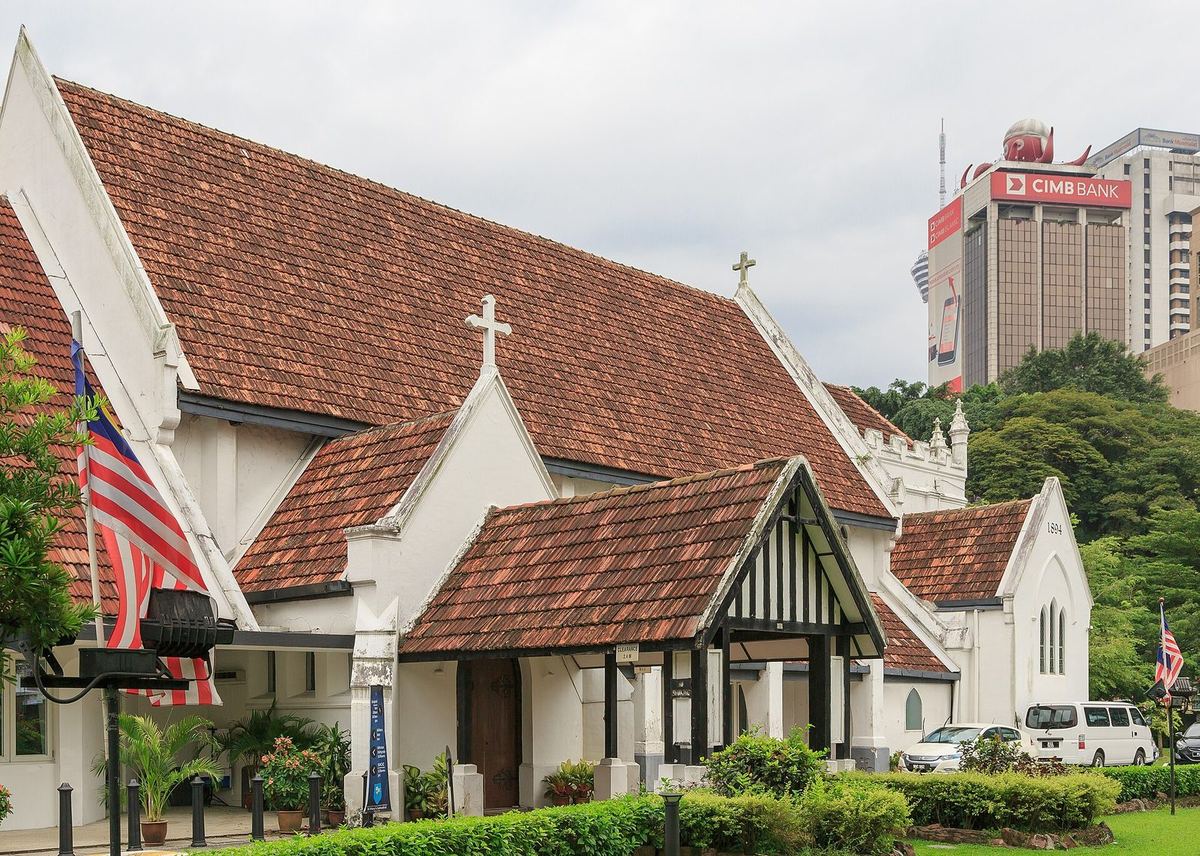 Tudor-style St Mary's Cathedral with red-tiled roof beside Dataran Merdeka, Kuala Lumpur