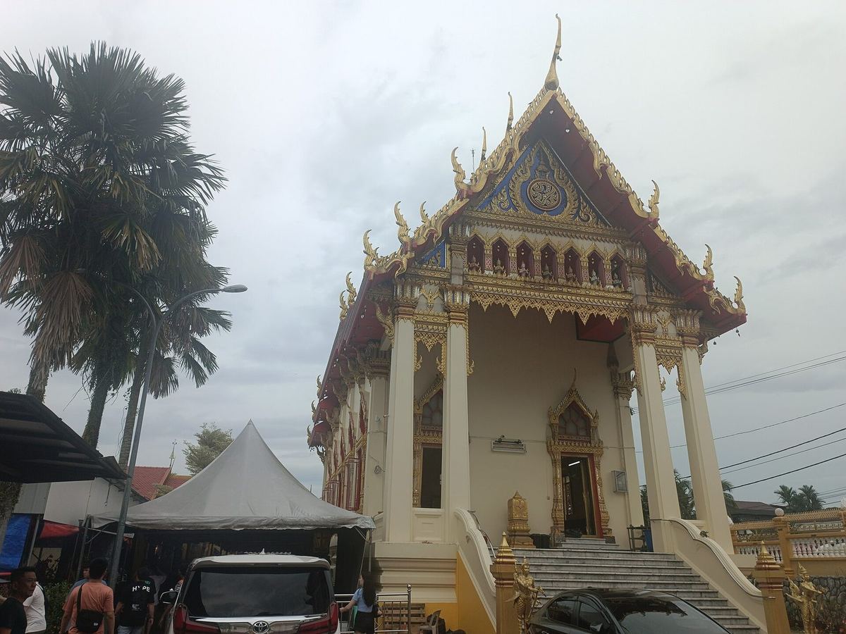 Gilded Thai-style ordination hall of Wat Chetawan Buddhist temple in Petaling Jaya, near Kuala Lumpur