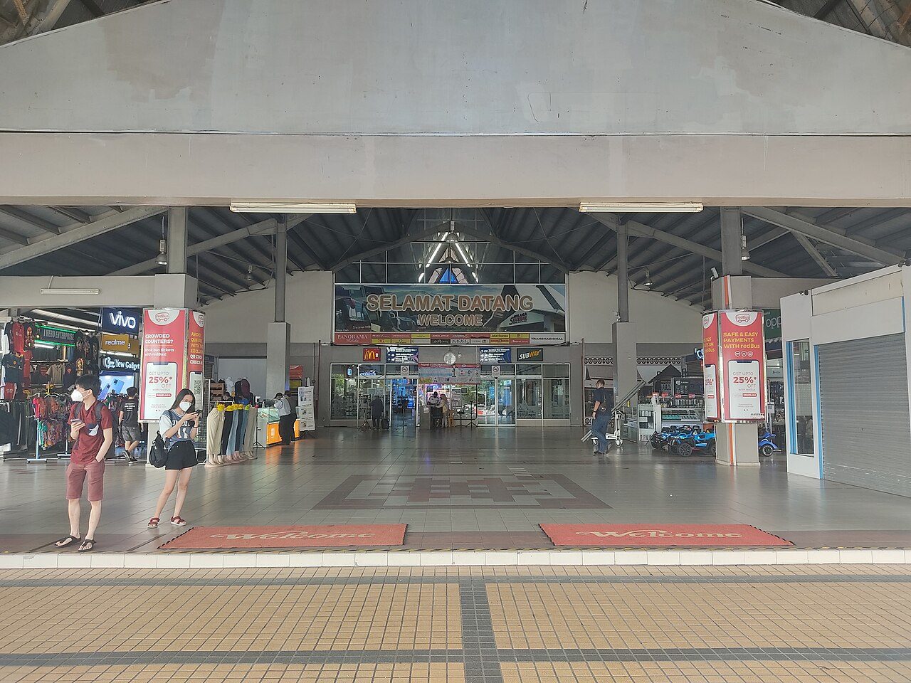 The covered main entrance of Melaka Sentral bus terminal, with a Selamat Datang welcome sign over the doors