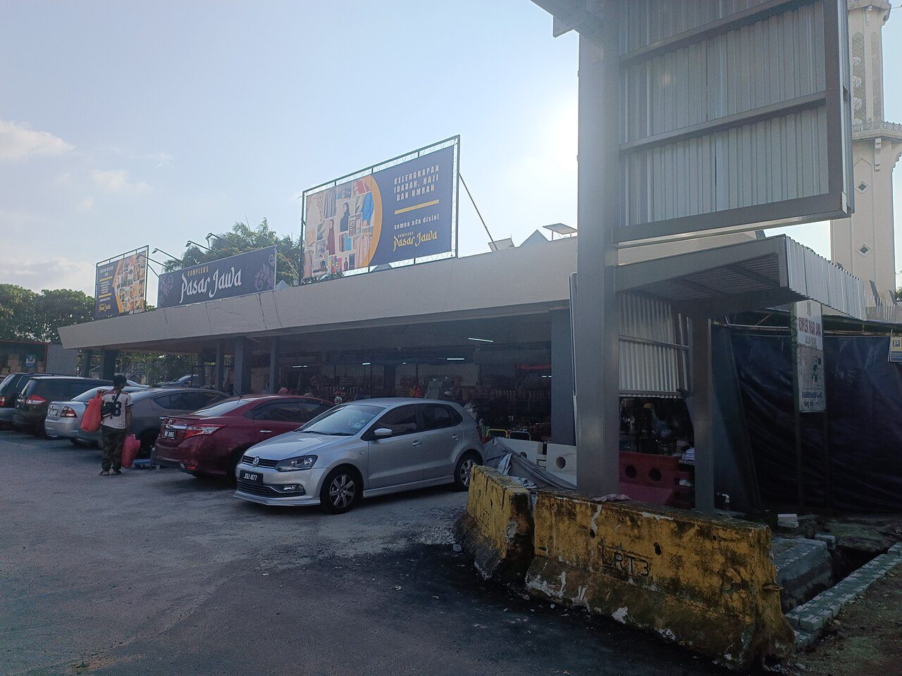 Kompleks Pasar Jawa market building with a mosque minaret behind it, Klang, Selangor