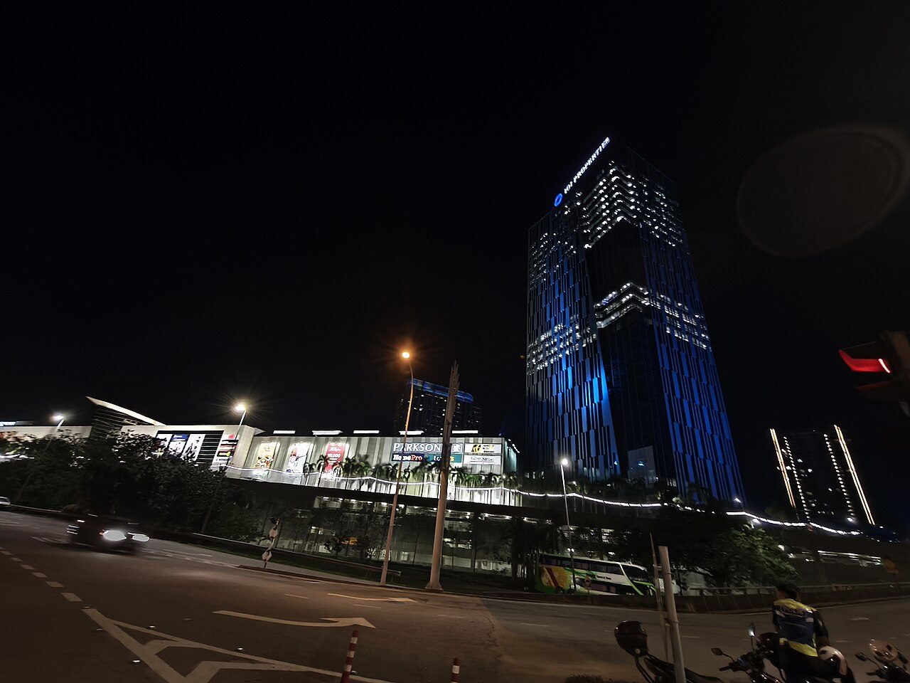 IOI City Mall in Sepang district lit up at night beside a hotel tower, one of the largest shopping malls in Selangor