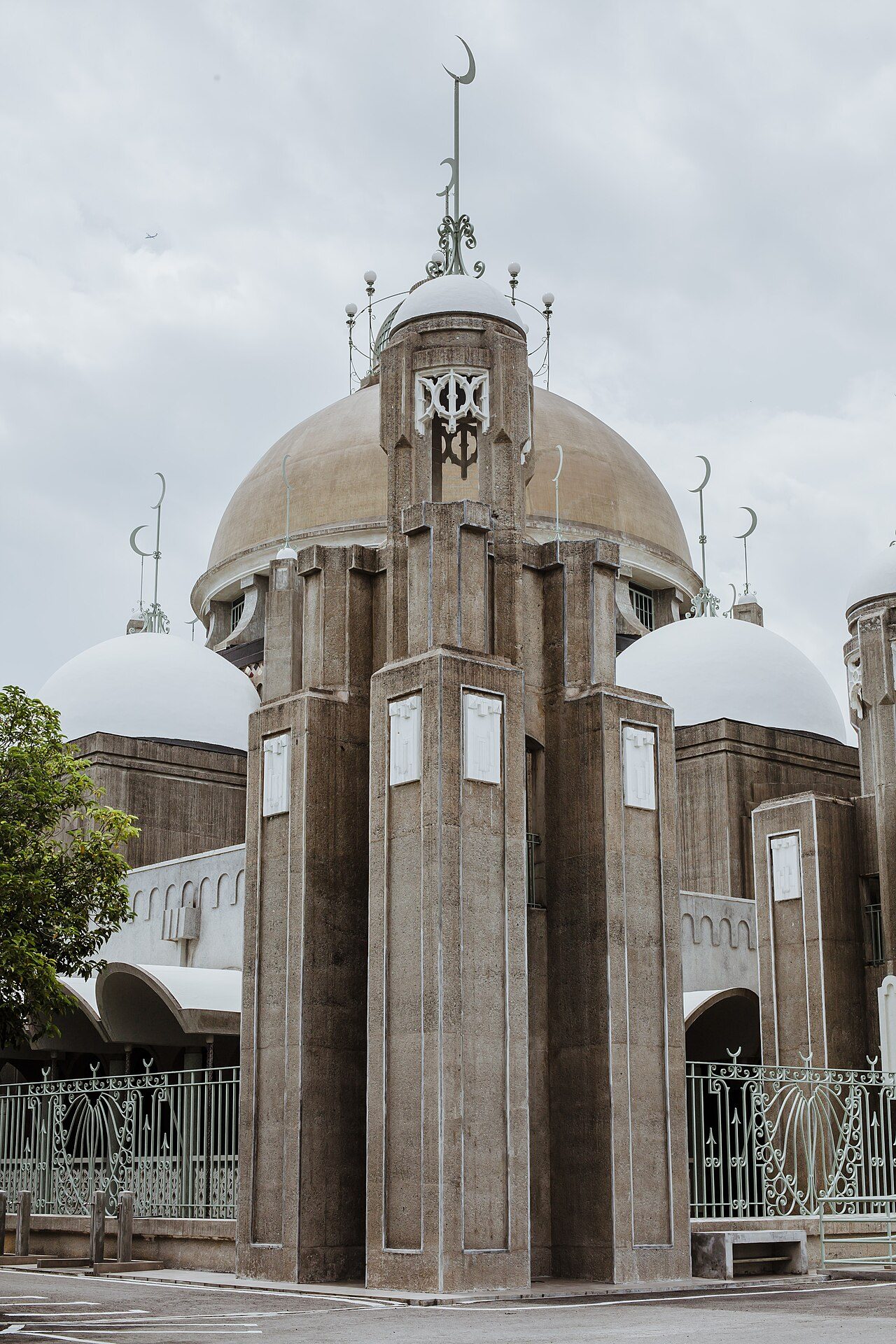 A tower and domes of Masjid Diraja Sultan Sulaiman in Klang