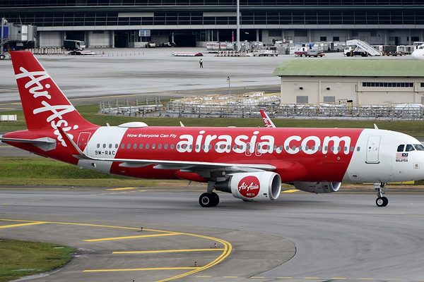 AirAsia Airbus A320 taxiing at Kuala Lumpur airport, picturing the Deepavali special fares