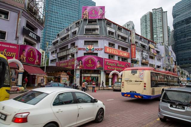 Colourful shopfronts on Jalan Tun Sambanthan in Little India, Brickfields, Kuala Lumpur