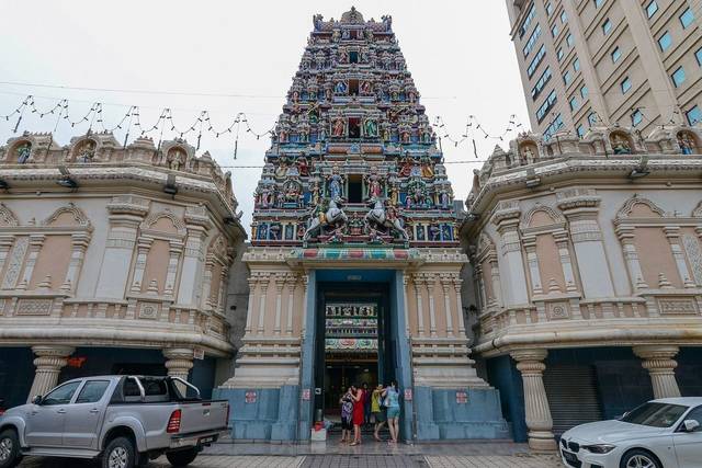 Sculpted gopuram tower over the entrance of Sri Mahamariamman Temple, Chinatown, Kuala Lumpur