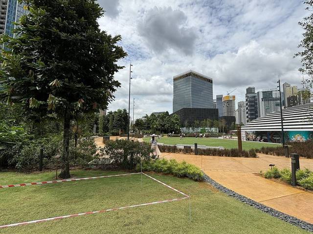 Lawns and paths of TRX City Park on the roof of The Exchange TRX, Kuala Lumpur