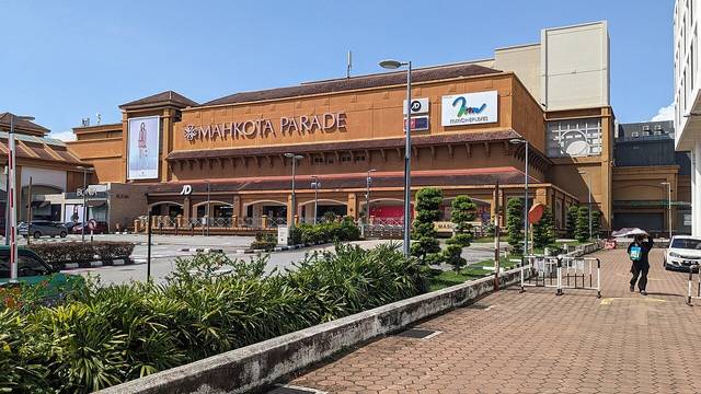 The orange facade and main entrance of Mahkota Parade shopping centre in Melaka, where Thai Odyssey has an outlet
