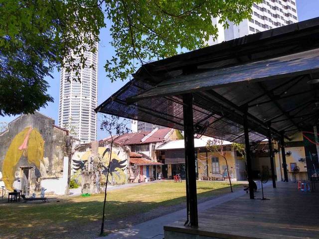 Courtyard and murals inside Hin Bus Depot art space, George Town, Penang