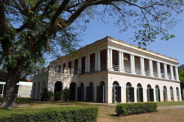 Two-storey Georgian mansion of Suffolk House on its lawn, Jalan Air Itam, Penang