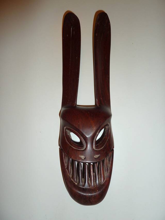 A carved wooden Mah Meri spirit mask